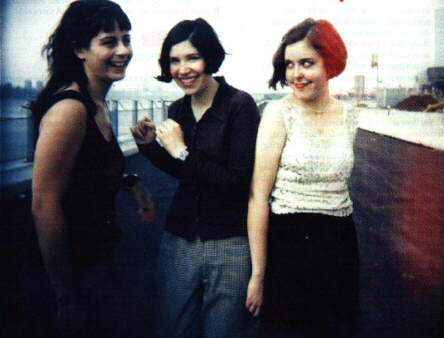 janet, corin, and carrie on a roof