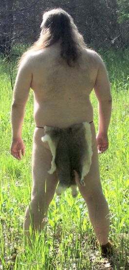 Songdog in rabbit loincloth, rear