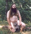 Rabbit skin loincloth, outdoors, kneeling, thumbnail