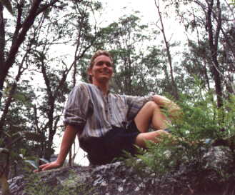 Malcolm sitting in the bush