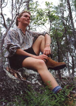 Malcolm perched on a rock