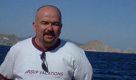 Gene in front of the tip of Cabo San Lucas.