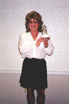 Photo of me with the IFGE Trinity Award for 1999, accepted in Louisville, Kentucky.