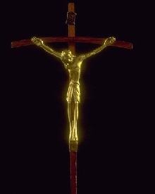 Photo of a golden Jesus on the cross