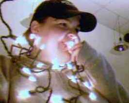 Christine chomping on Christmas lights