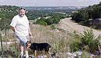 A Pilgrim and his dog at Enchanted Rock.