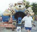 Pilgrim at a carnival ride called The Bear Affair.