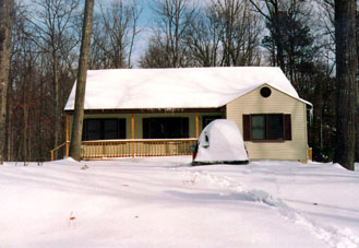 House buried under lots of snow