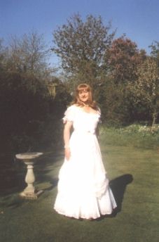 White Ball Gown with Pink Ribbons