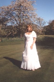 White Ball Gown with Pink Ribbons