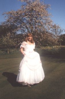 White Ball Gown with Pink Ribbons