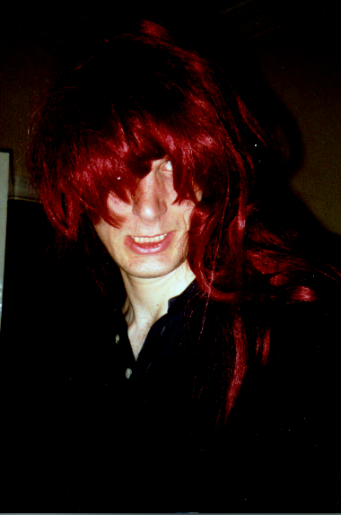 rob in a funny wig