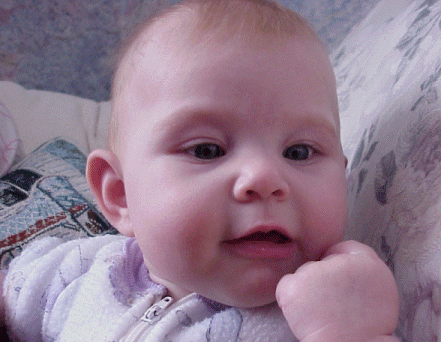 Robyn eating her fist!