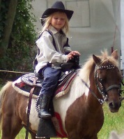 Robyn riding a pony