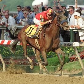 Real Quiet wins at Pimlico