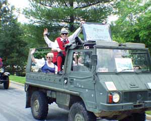 Photo of the Alpine Dancers riding in Steve's Pinzgauer vehicle