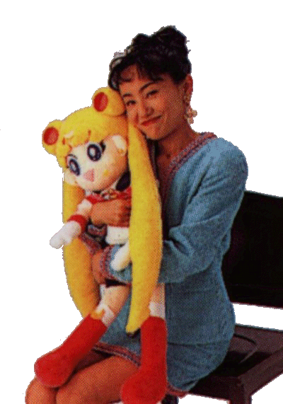 Naoko Takeuchi cuddles up with her #1 creation