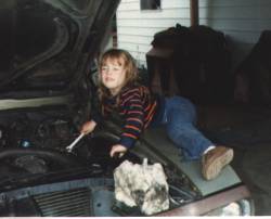 Even as a little girl, she liked to work on stuff!