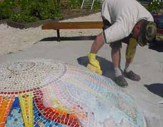 Bruce washing off excess grout 7.9.